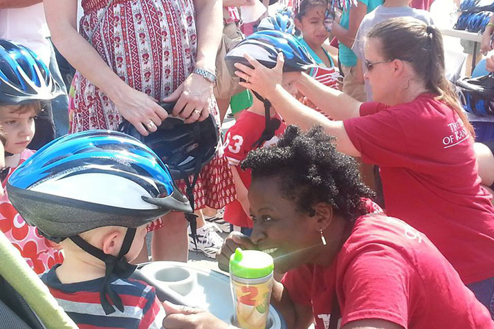 Headstrong for Jake distributed bike helmets at VillageFest for 10 years. This year, the group won't host the helmet fitting event at it reassesses how to promote bike safety.