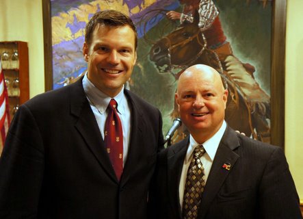 Kobach with Metsker at a Johnson County Republican Party Elephant Club event in 2011. Photo via JCRP.