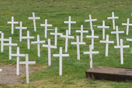 The Roeland Park city council continues to struggle with how to handle a display of crosses set out during abortion awareness month, like the one above in Washington state, under city code. Photo via Flickr.