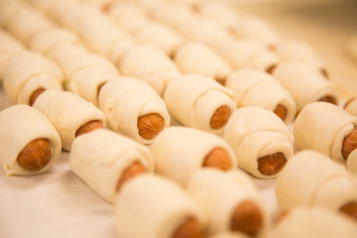 Pretzel-wrapped sausages feature meat from Fritz's.