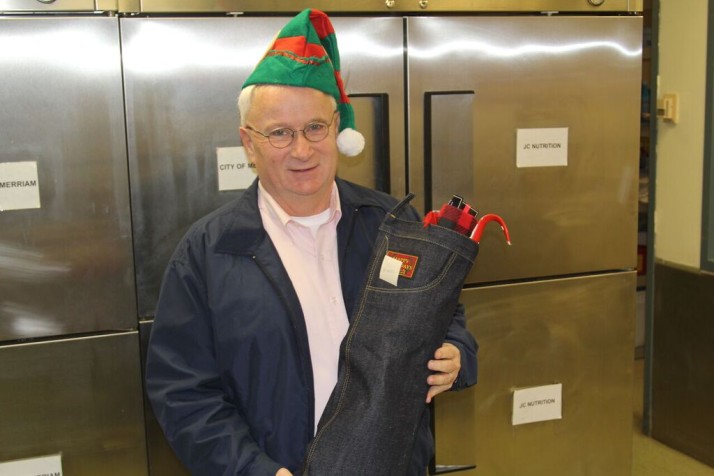Couty Commissioner Jim Allen was among the crew that delivered stockings to Meals on Wheels clients Wednesday. Photo courtesy Johnson County Government.