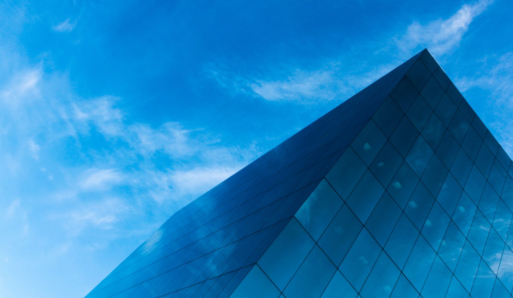 building in the clouds to represent how evaluating HR processes lead to the cloud