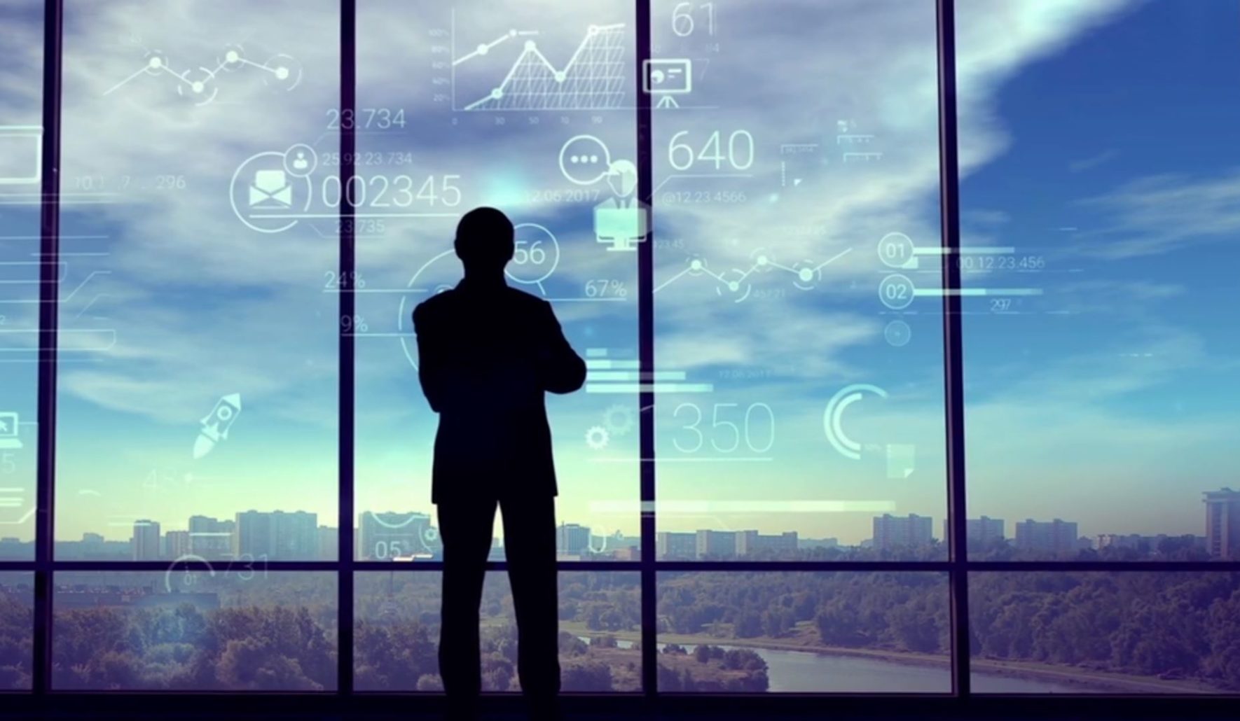 A man stands at the window thinking with data graphics appearing