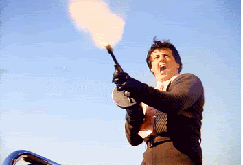 1361984680_stallone-tommygun.gif