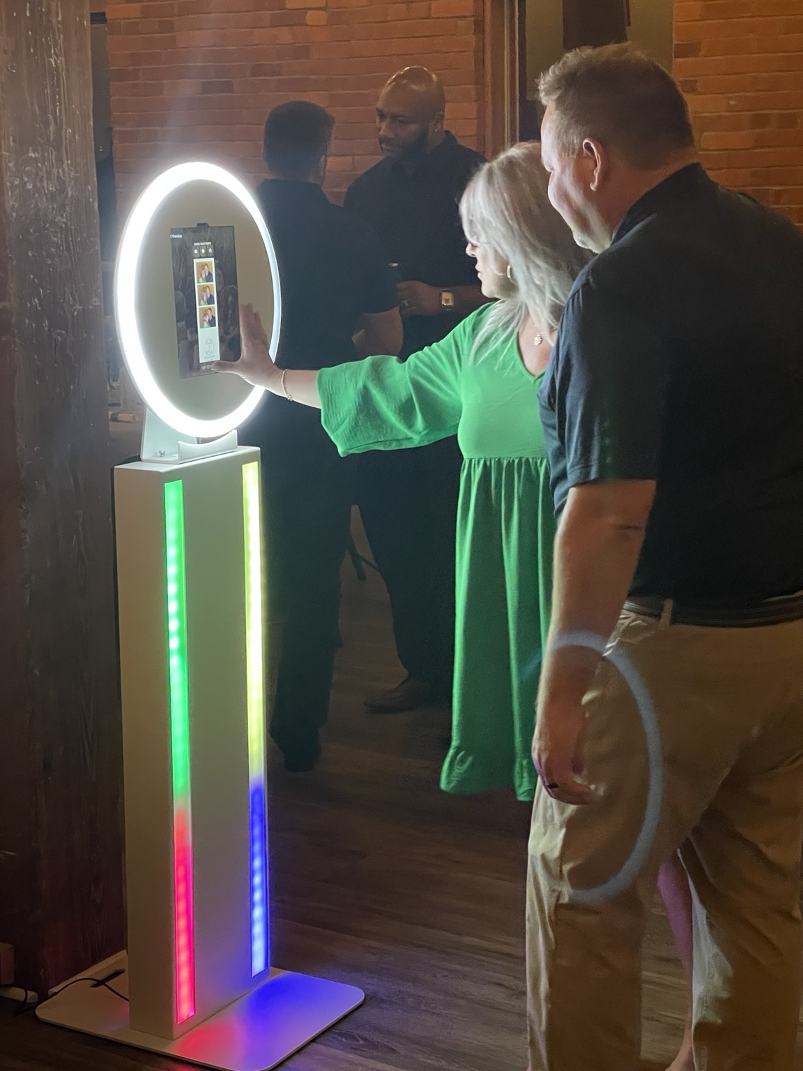 Guests using the Raspy Media Social Photo Booth at a live event