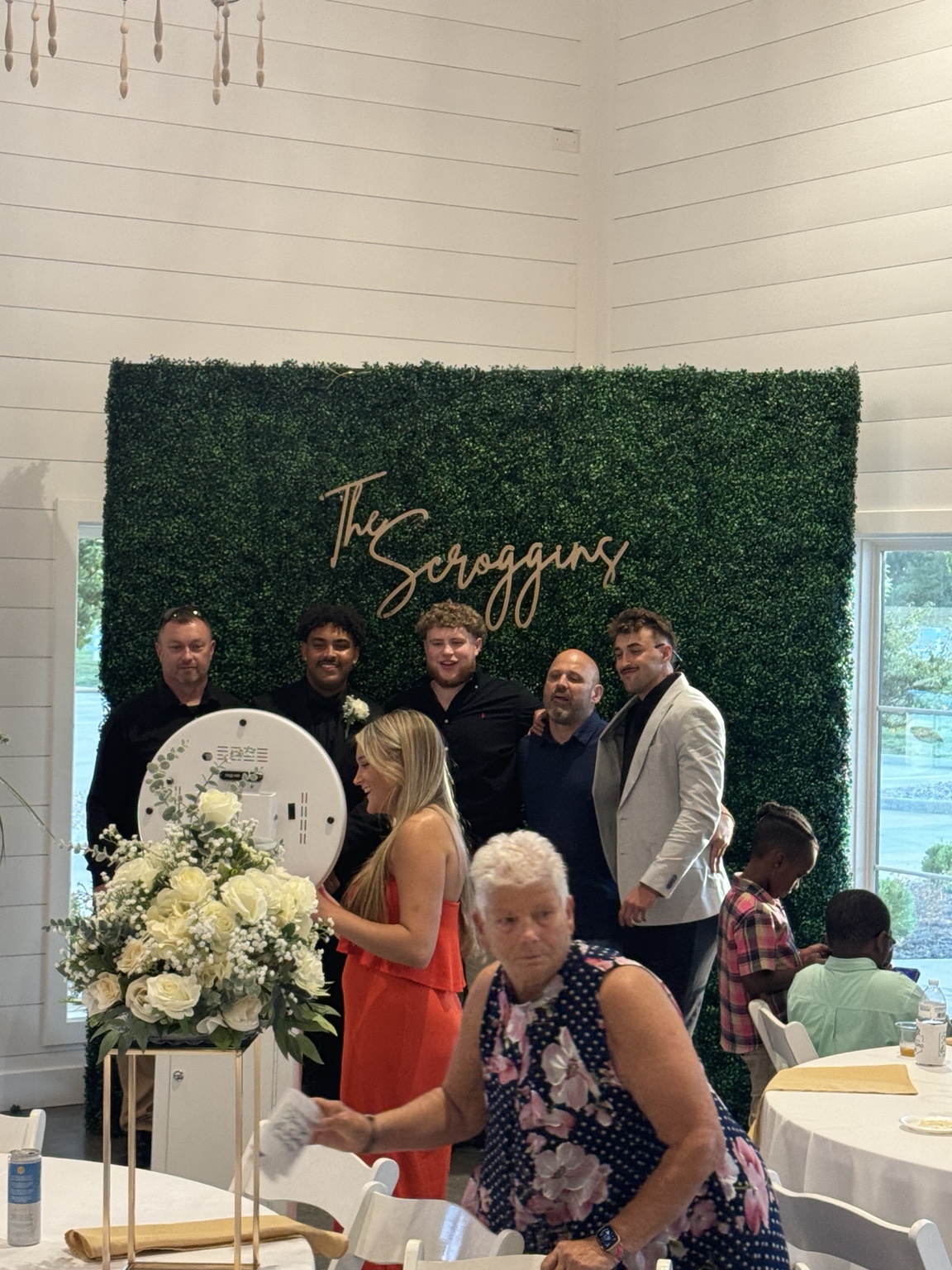 Raspy Media Social Photo Booth in use at a wedding reception