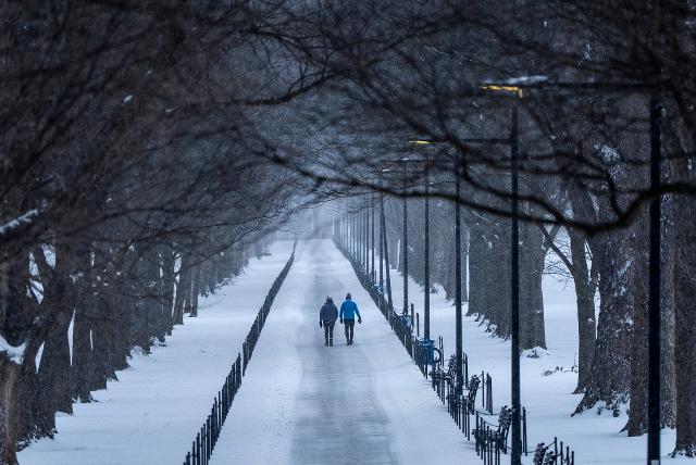 AP News: Massive winter storm dumps sleet, freezing rain and snow around much of US