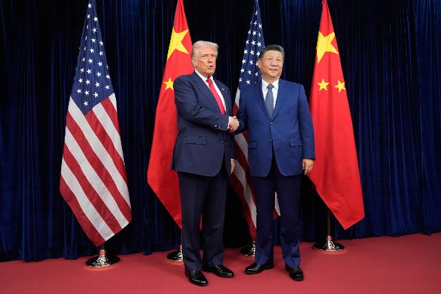 AP News: The Latest: Trump says he has deals with China after meeting Xi to try to solve trade tensions