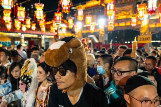 AP News: Lunar New Year prayers, robots and festivities usher in the Year of the Horse