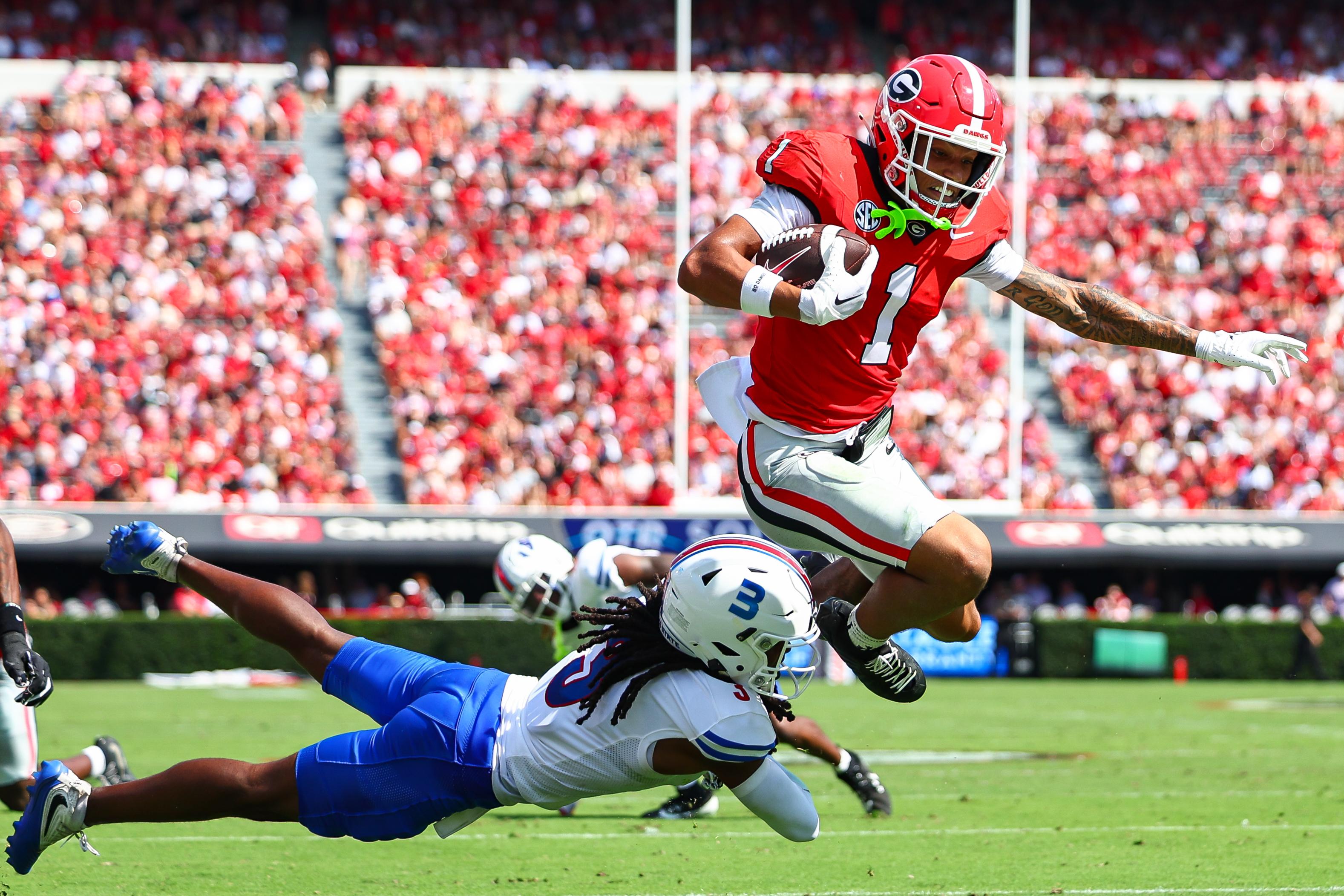 Stockton has 3 TD passes and Frazier runs for 3 scores as No. 3 Georgia beats Tennessee State 63-3
