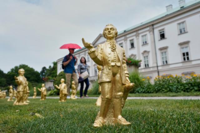 A horde of golden mini-Mozarts marks 270 years since the composer's birth in Salzburg