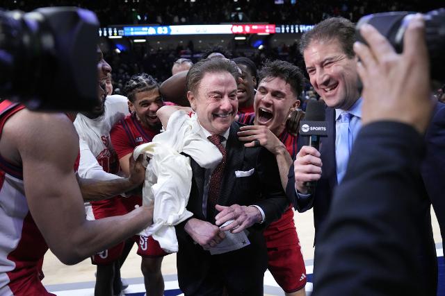 AP News: Rick Pitino savors reaching 900 victories as a college head coach in St. John's win over Xavier