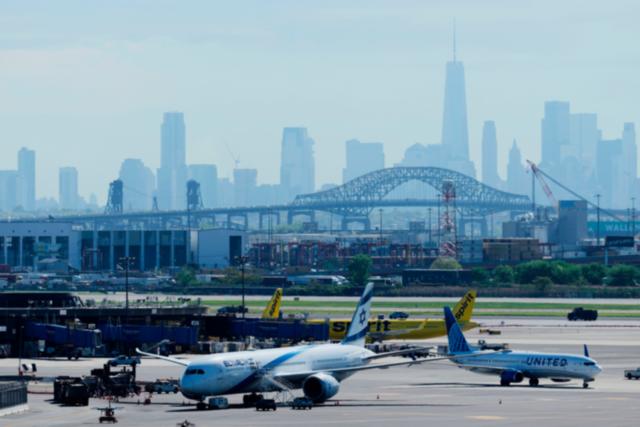 AP News: United flight landing in Newark strikes pole on New Jersey Turnpike, damages delivery truck