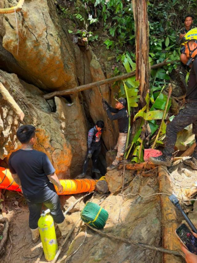 AP News: Search continues for 7 villagers trapped in a flooded cave in Laos