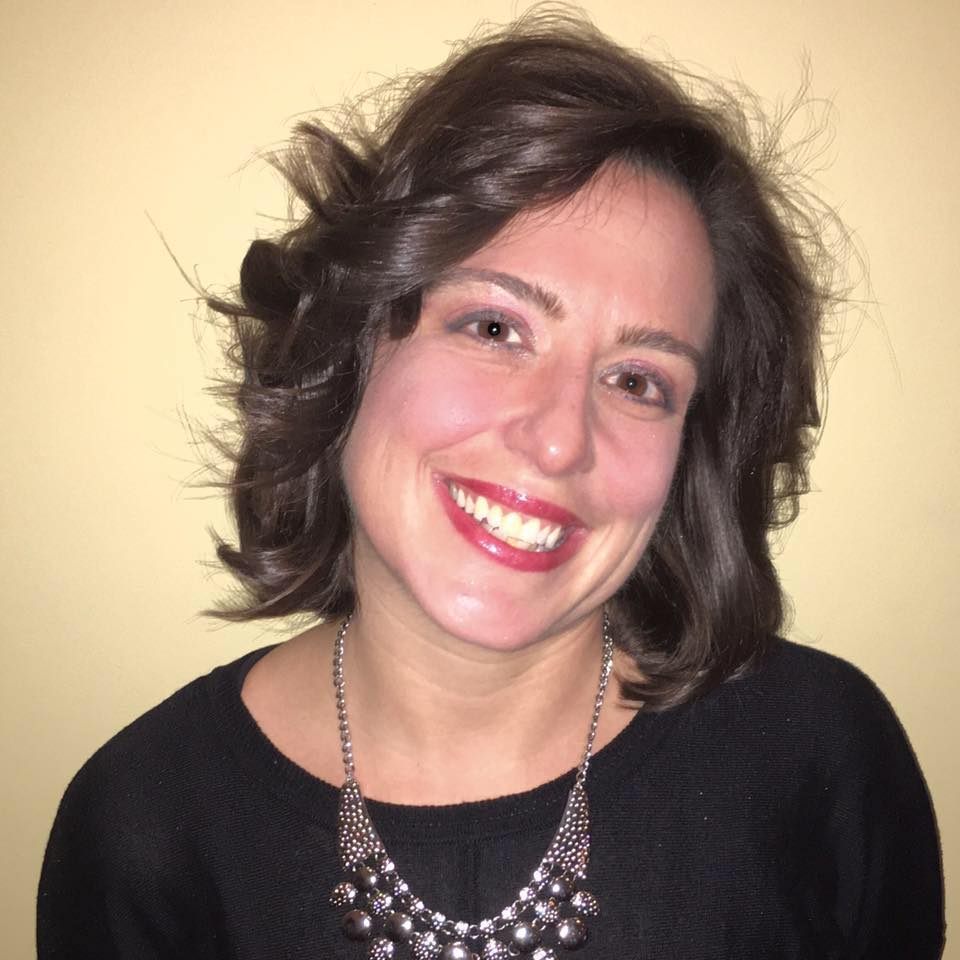 Picture of Kristin Morris with shoulder length brown hair smiling
