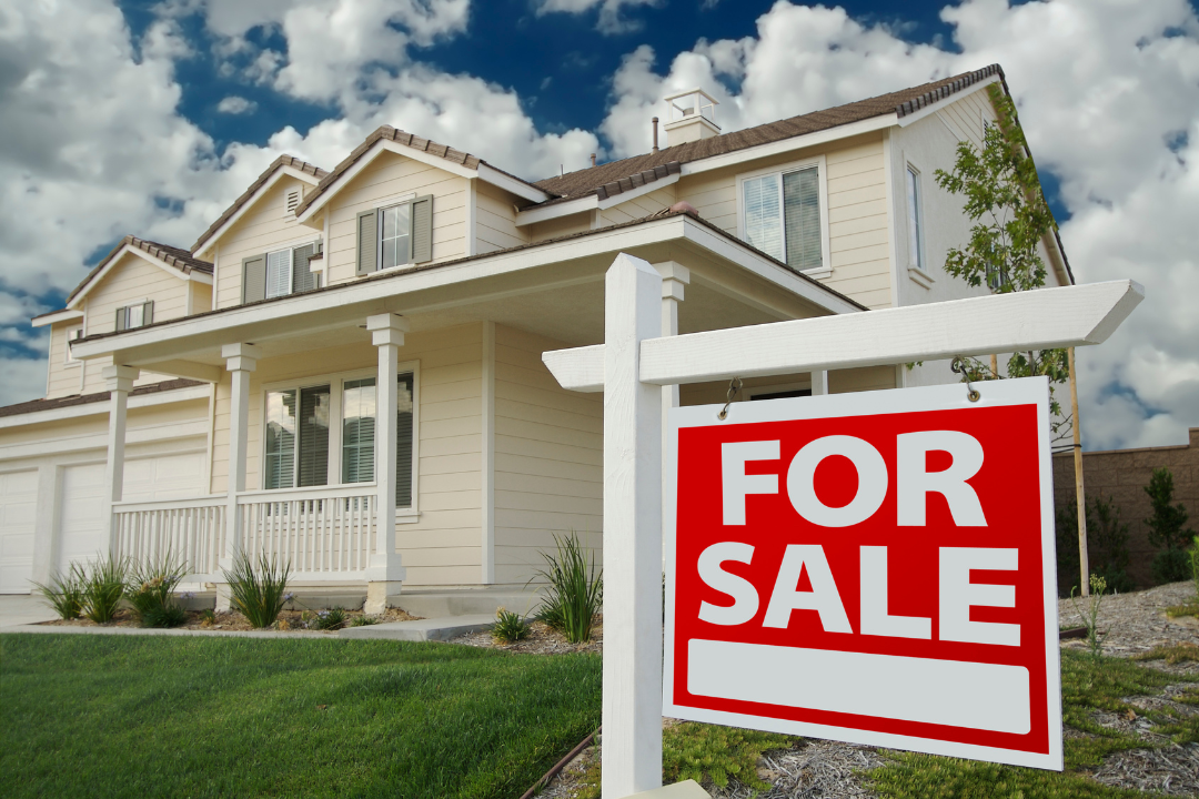 house with for sale sign