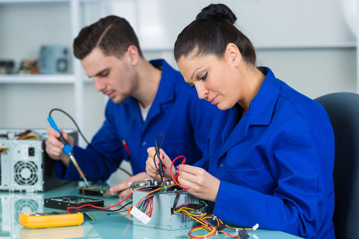 students in electronics class at university