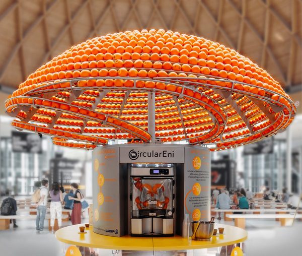 A Giant Circular Juice Machine That Turns Discarded Peels of Squeezed Oranges Into 3D Printed Juice Cups