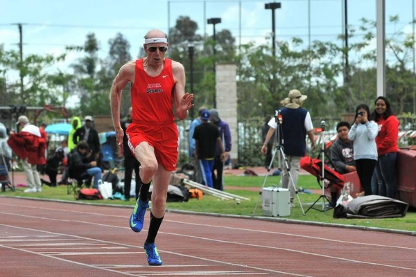 The lanky Stone was the top high school hurdler in Omaha and a walk-on hurdler at Kansas. He knows the game of track & field. (photo Chris Stone)