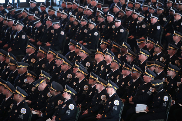 Chicago police officers attend a graduation and promotion ceremony at Navy Pier in November 2018. | Scott Olson/Getty Images