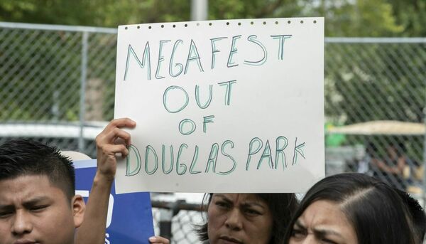 As Riot Fest crews set up in Douglass Park, Little Village, Lawndale residents keep pushing for music festival to leave