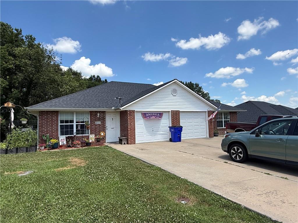 Photo of 208-210 NW Woodbury Drive Grain Valley MO 64029