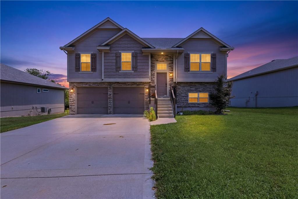 Photo of 809 N Whispering Hills Drive Lone Jack MO 64070
