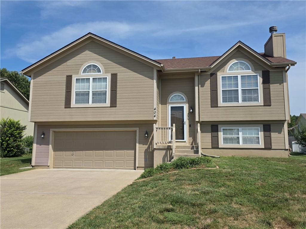 Photo of 404 Blue Grass Drive Raymore MO 64083