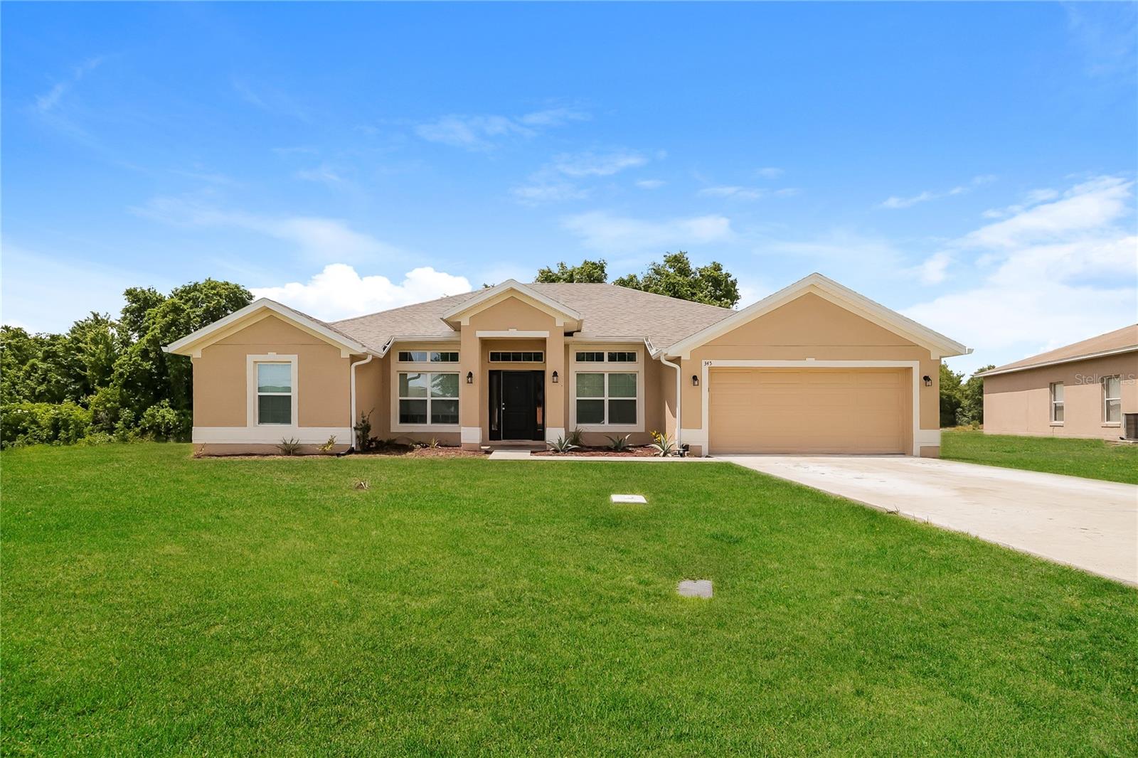 Photo of 345 CIMARRON COURT POINCIANA FL 34759
