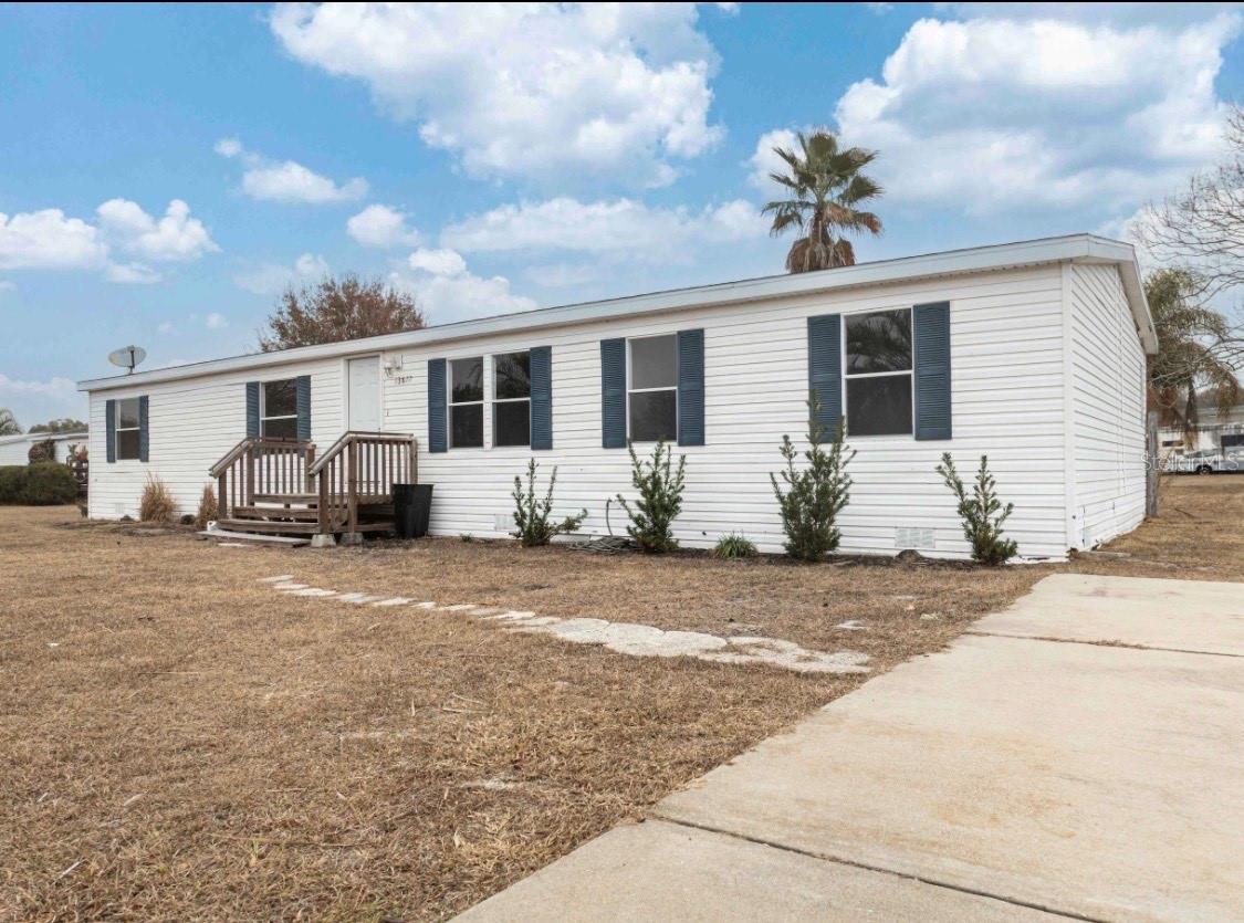 Photo of 13877 COUNTY ROAD 109F LADY LAKE FL 32159