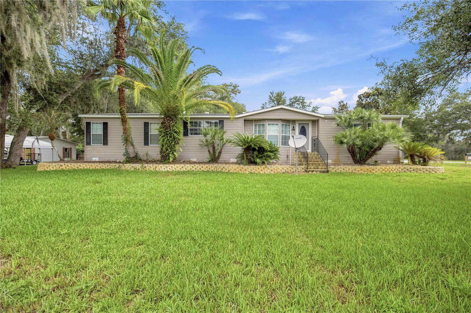 Photo of 8420 COUNTY ROAD 109 A1 LADY LAKE FL 32159