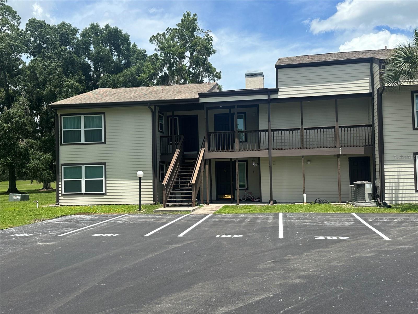 Photo of 17202 SANDALWOOD DRIVE #202 WILDWOOD FL 34785