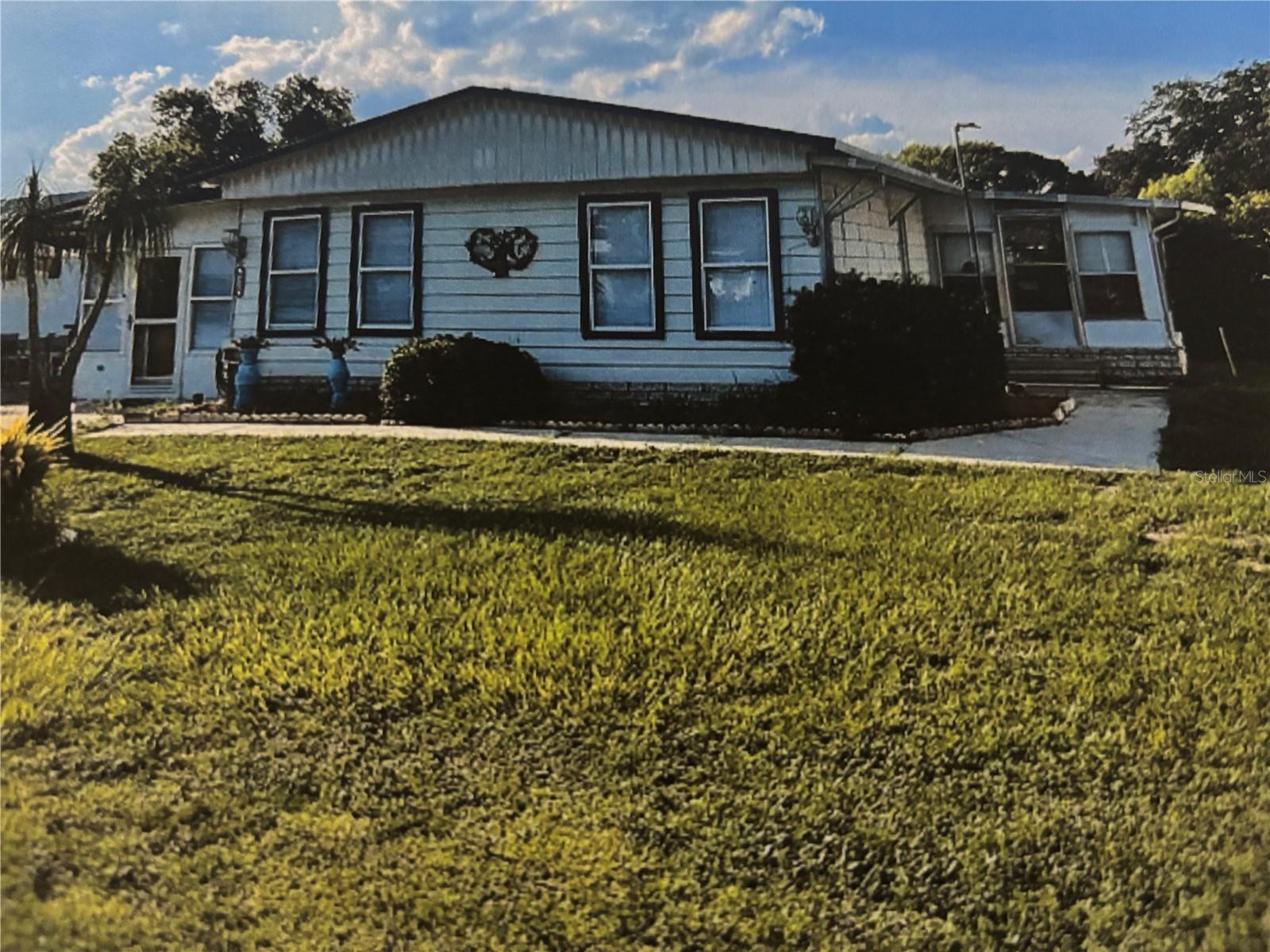 Photo of 4325 WATER OAK LANE #54 ZELLWOOD FL 32798