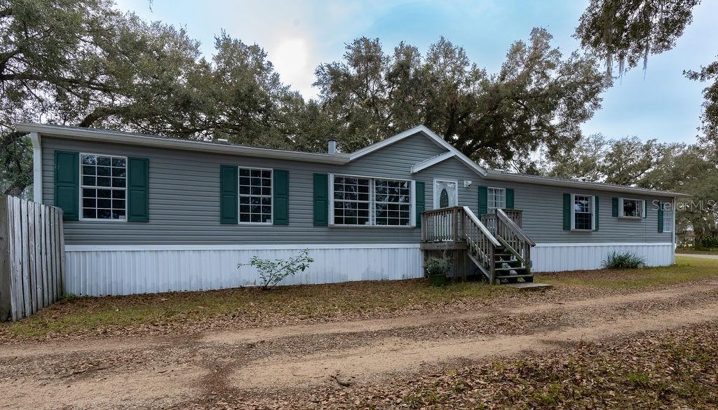 Photo of 13811 COUNTY ROAD 109D LADY LAKE FL 32159