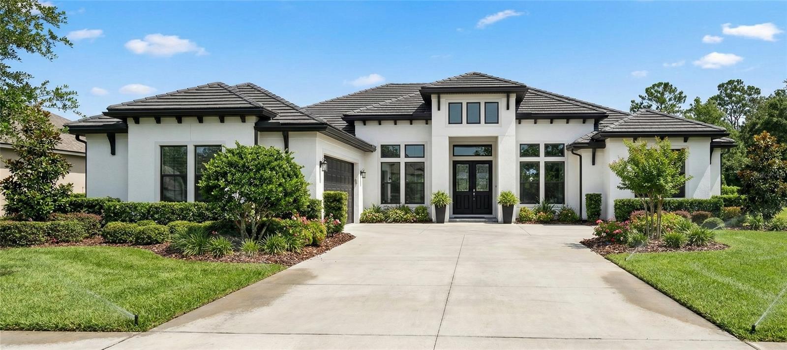 Photo of 142 TRANQUIL MIRROR LAKE COURT #Lot 18 CLERMONT FL 34711
