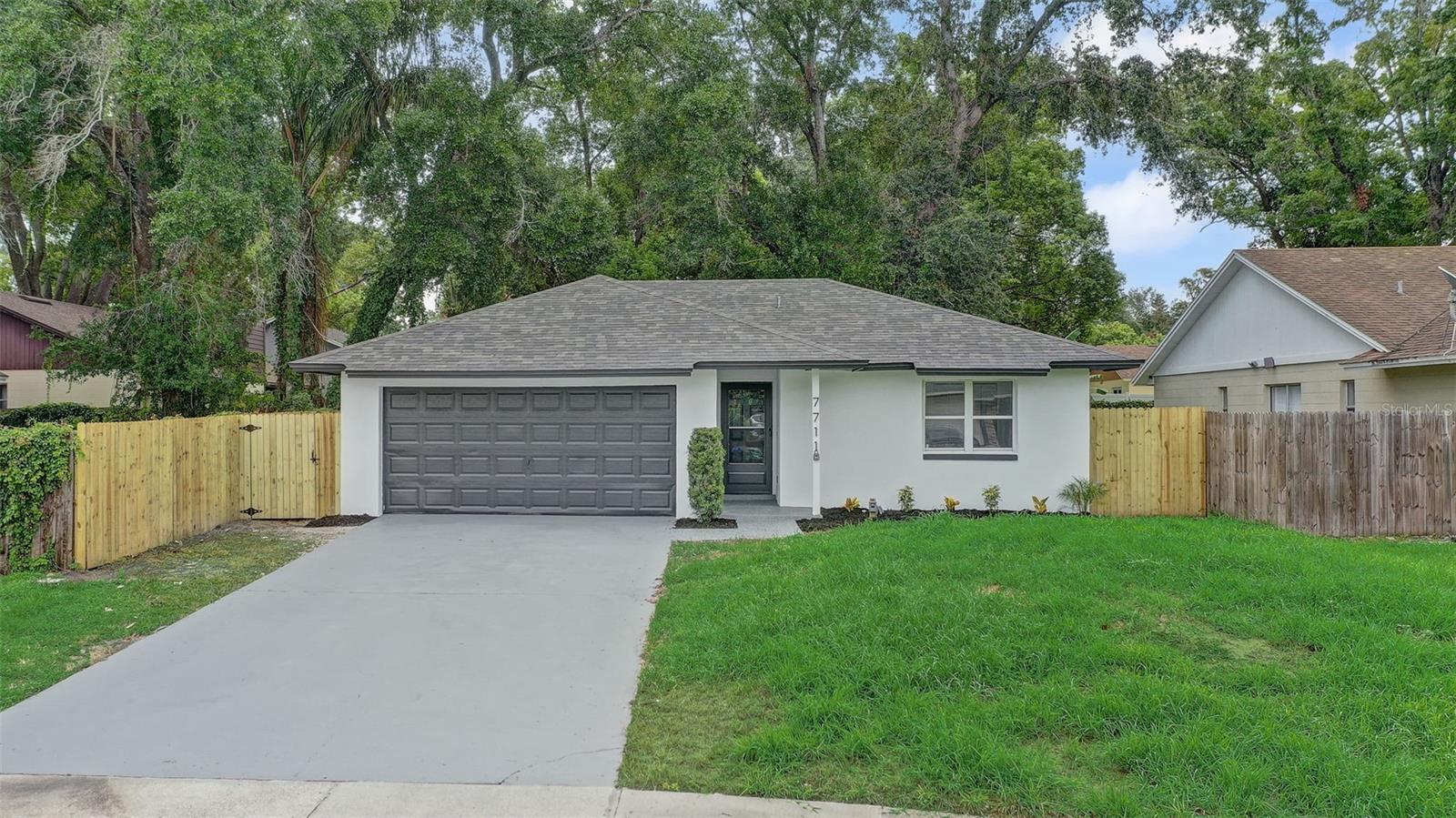 Photo of 7711 LAKESIDE WOODS DRIVE ORLANDO FL 32810