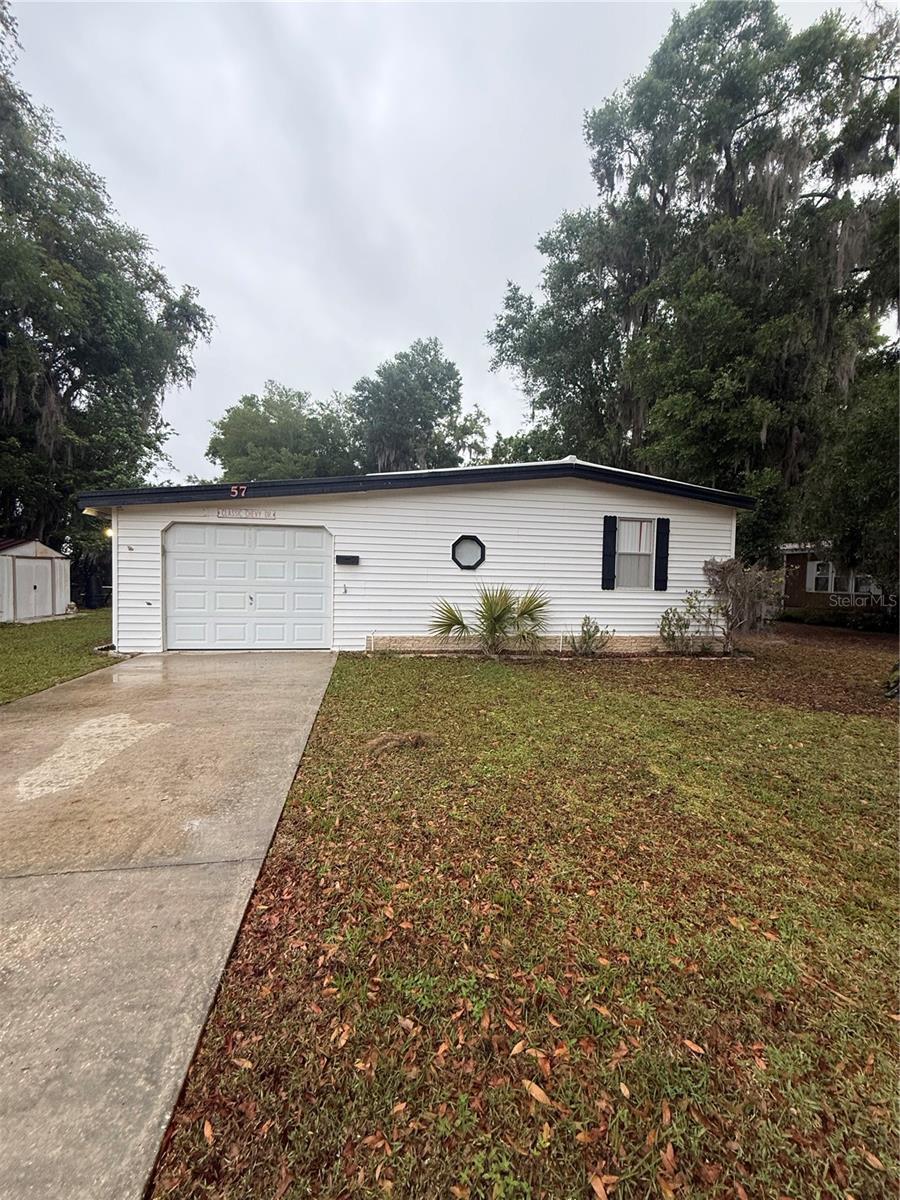 Photo of 57 N BOBWHITE ROAD WILDWOOD FL 34785
