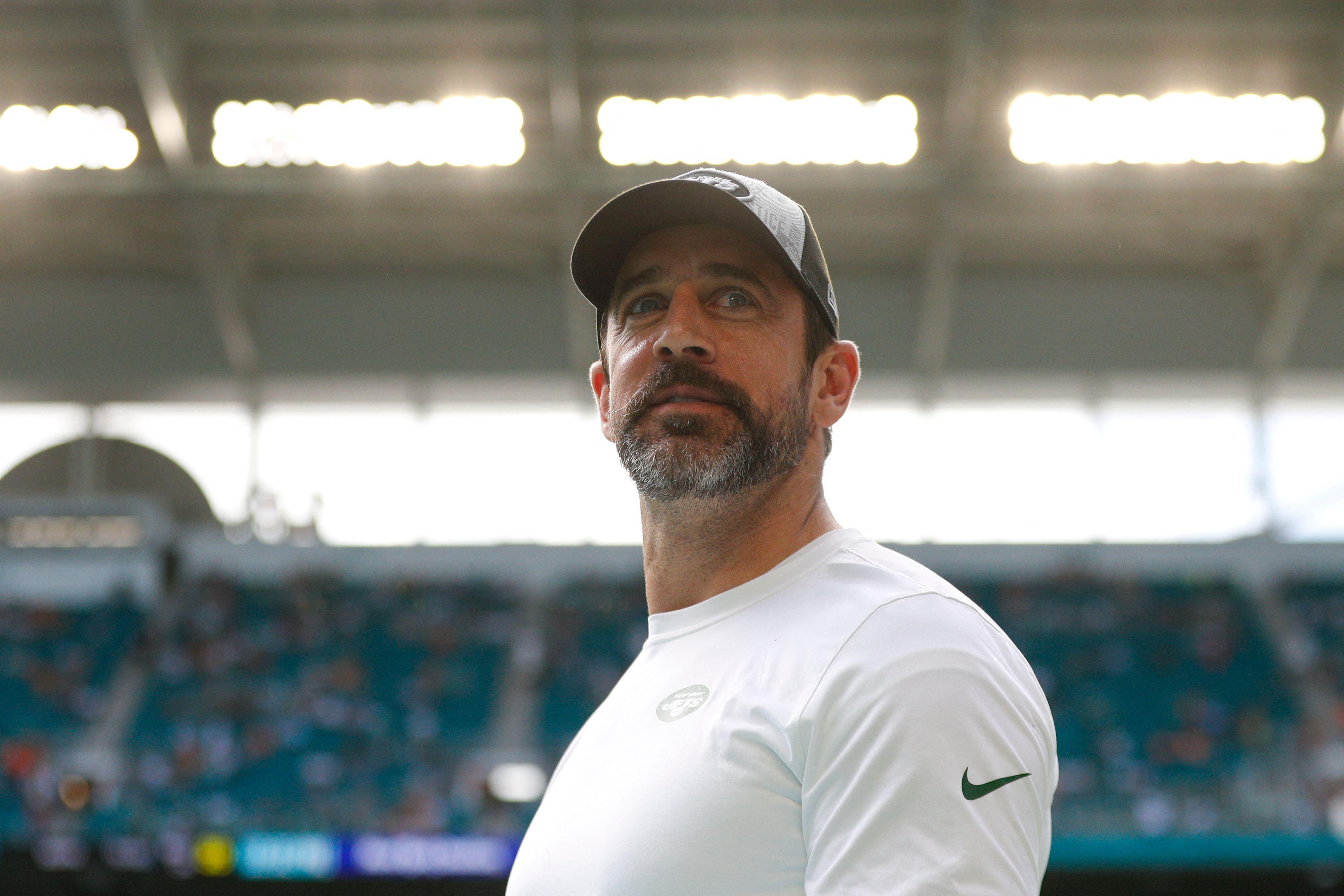 New York quarterback Aaron Rodgers walks on the field prior to an NFL regular season game against the Miami Dolphins, Sunday, December 17, 2023