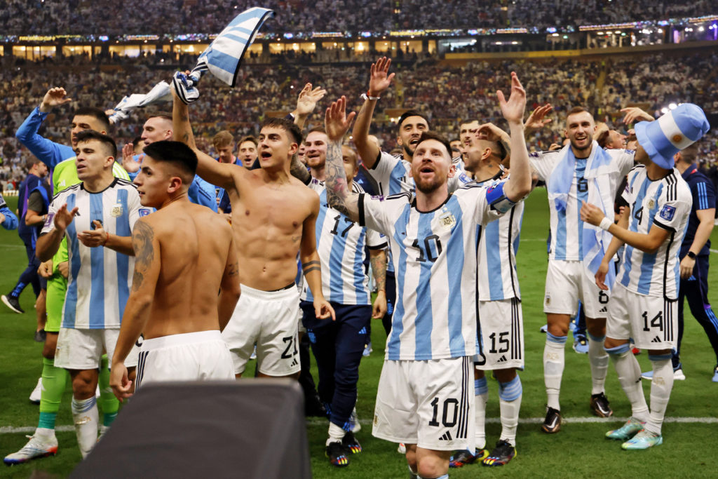 Argentina forward Lionel Messi (10) and teammates celebrate after winning the 2022 World Cup final against France at Lusail Stadium. Mandatory Credit: Yukihito Taguchi-Imagn Images