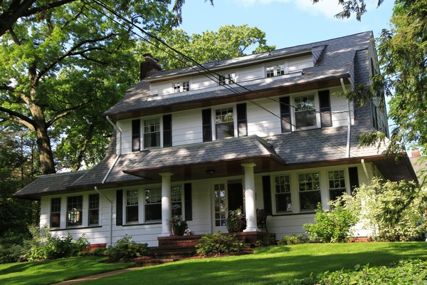 Classic Center Hall Dutch Colonial