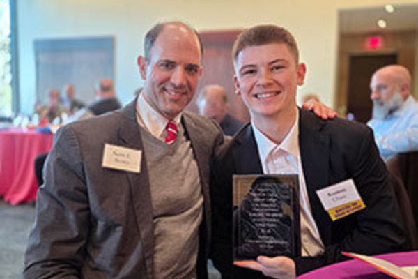 Wabash College sophomore Kenton Chase (right) earned a "Realizing the Dream" scholarship from Independent Colleges of Indiana. He's pictured here at the banquet honoring the recipients with Dean of Students Scott C. Brown.