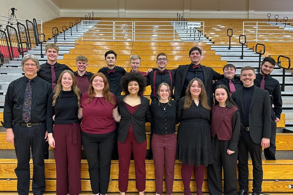 Representation of the achievement named 'Concordia's Maroon Standard Qualifies for State Vocal Jazz Finals'.