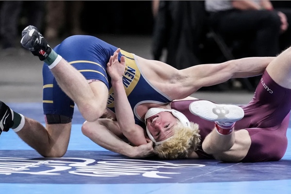 Representation of the achievement named 'Nolan Winnicker Competes at IHSAA State Wrestling Finals'.