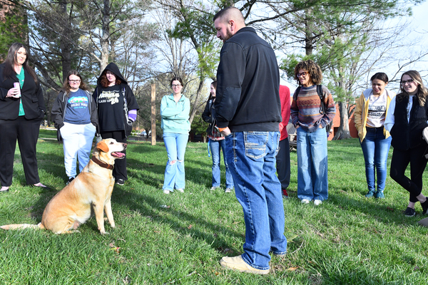 Columbia Police Department Sgt. Trevor Foster discusses the K9 unit, Cally, with Lindsey Wilson University students in counseling professor Mahalia Cain’s “Substance Abuse” class on Thursday, March 19.