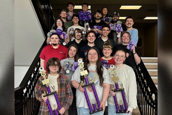 Representation of the achievement named 'Speech and Debate Wins Tournament'.