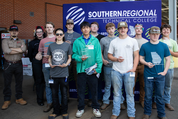 Left to right: Jones Welding representatives Judge Jones and Candice Godby, Mason Horace, Mia Boyd, Sullivan Ochs, Juan Angeles, Colby Bishop, Dane Frock, Luke Roberson, Cason Roberts, Preston Riggins, and Ryder Harrell