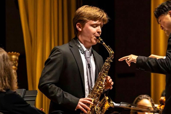 Representation of the achievement named 'Quin Coltman wins Butler concerto competition'.