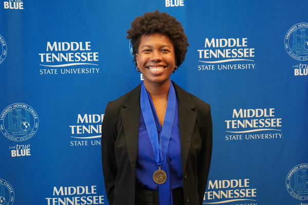 Representation of the achievement named 'Bullock successfully defends Honors thesis at MTSU'.