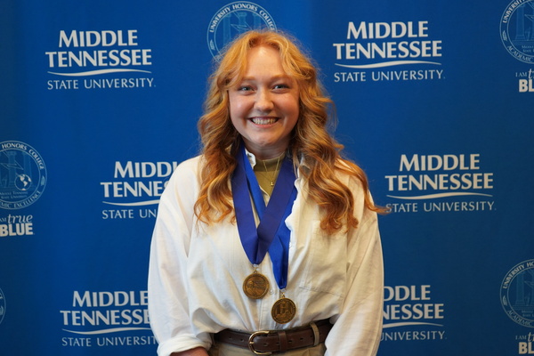 Representation of the achievement named 'Lena Eccles successfully defends Honors thesis at MTSU'.