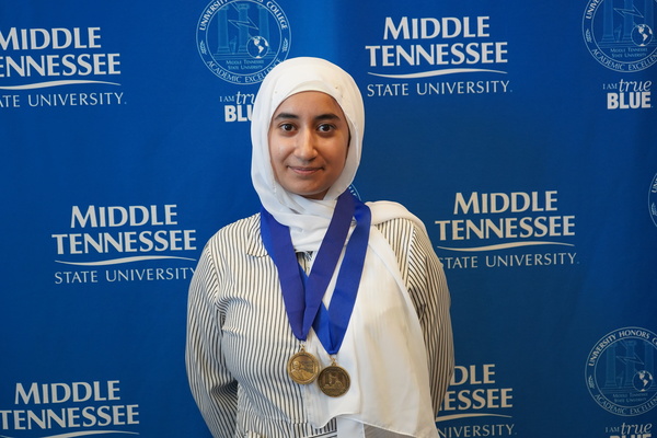 Representation of the achievement named 'Sara Hauter successfully defends Honors thesis at MTSU'.